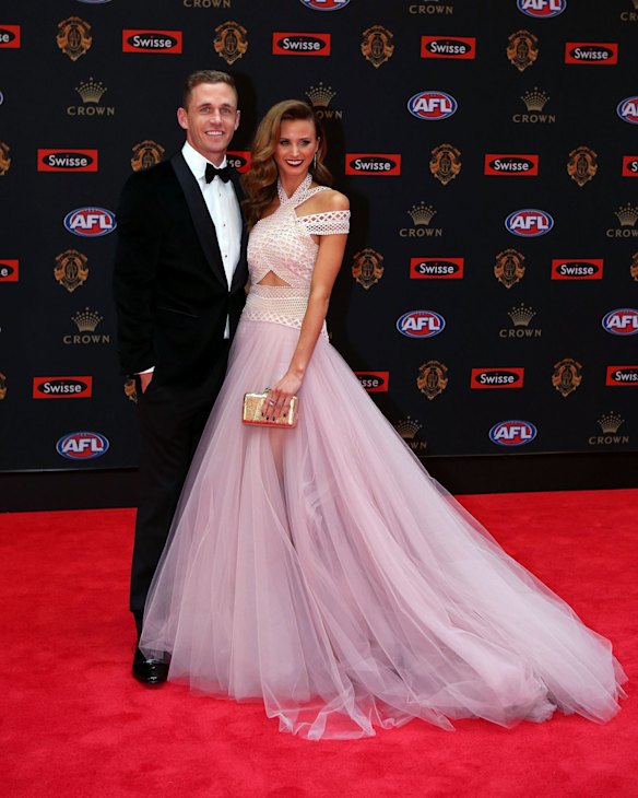 Joel Selwood of the Geelong Cats and Brit Davis pose on the red carpet ahead of the 2016 AFL Brownlow Medal count at Crown Palladium on September 26, 2016 in Melbourne, Australia.