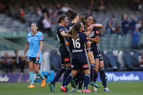 Melbourne Victory celebrate a goal by Darian Jenkins.