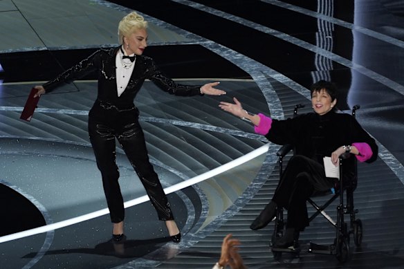Lady Gaga, left, and Liza Minnelli present the award for best picture.
