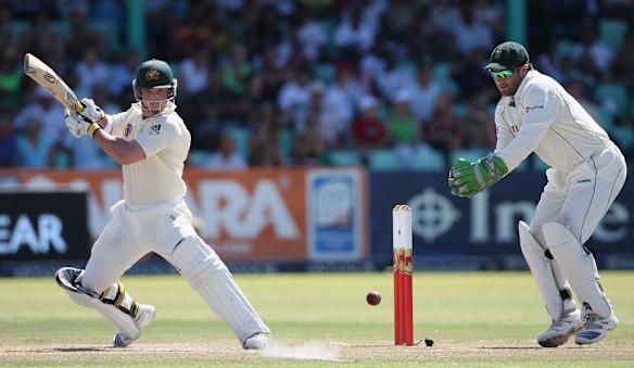 Phillip Hughes cuts a delivery against South Africa on his way to scoring a Test century in Durban.