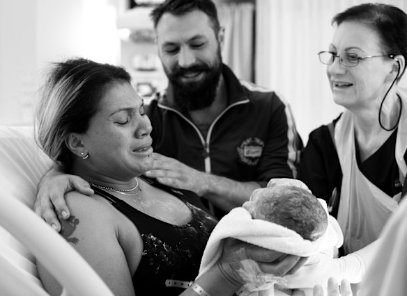 Apollo was Martine Ainuu's fourth baby but everyone of her births has been different and this one was definitely the most painful, so painful that the midwife, Deborah Robinson, (right) had to ask her not to hurt or push father, Matt Bellamy, away. This is the moment of relief and joy when she holds Apollo for the first time.