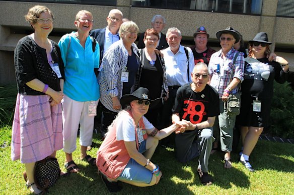 Some of the living members of the 78ers after the apology.