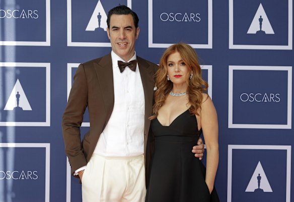 Sacha Baron Cohen and Isla Fisher arrive to attend a screening of the Oscars in Sydney.