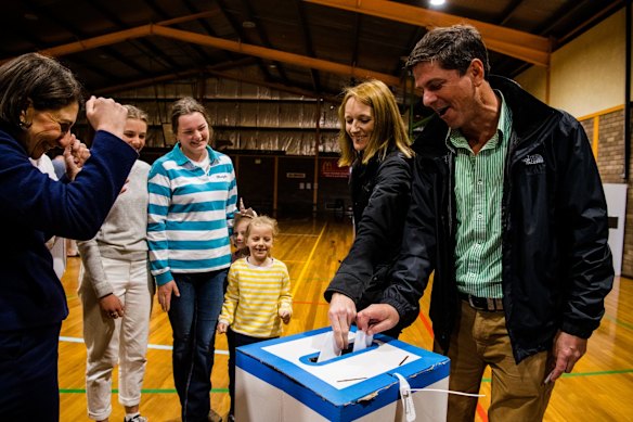 Nationals candidate Dave Layzell - casting his vote with his wife.