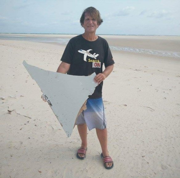 Blaine Gibson with the “no step” piece of the wreckage he found off the Mozambique coast.
