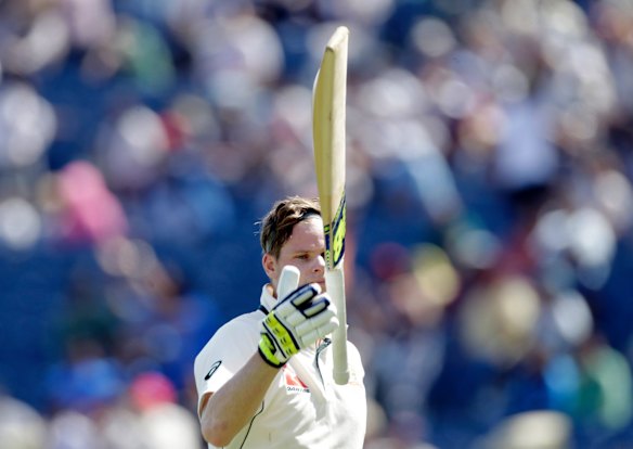 Australia's captain Steve Smith walks back to the pavilion after getting out.
