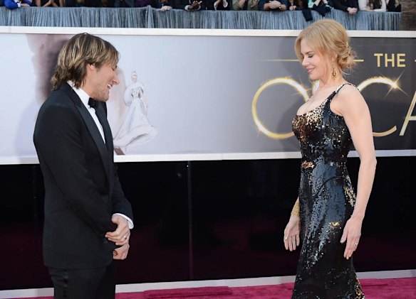 Singer Keith Urban and actress Nicole Kidman arrive at the Oscars.