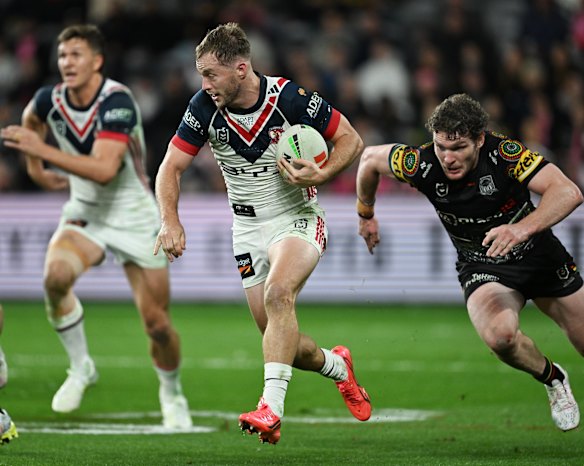 In demand: Roosters half Sam Walker finds a gap against the Panthers on Thursday night.