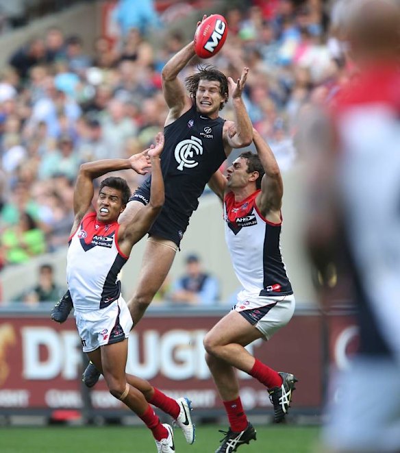 Bryce Gibbs flies for a big pack mark.