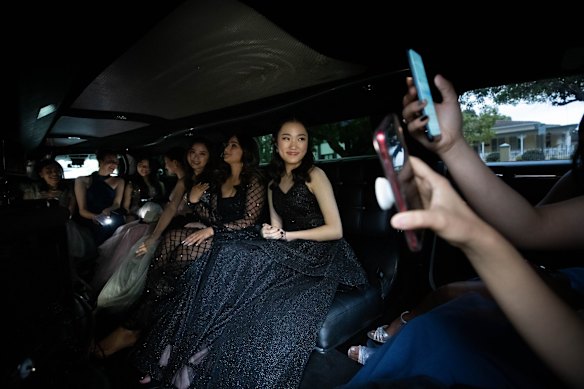 Strathfield Girls High School students, head to their school formal in a limousine.