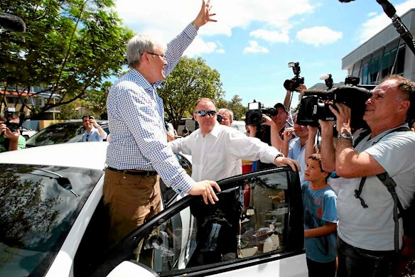 Prime Minister Kevin Rudd leaves the Parap markets.