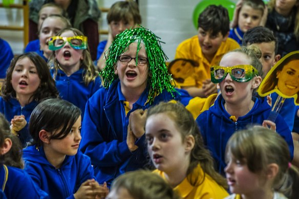 Giralang Primary school. The school where Olympic 400 meter hurdler teaches excitedly watches her compete in the semi-final event at the Rio Olympic games. Riley McQueenie (left) Mackenzie Miller show their Aussie spirit.