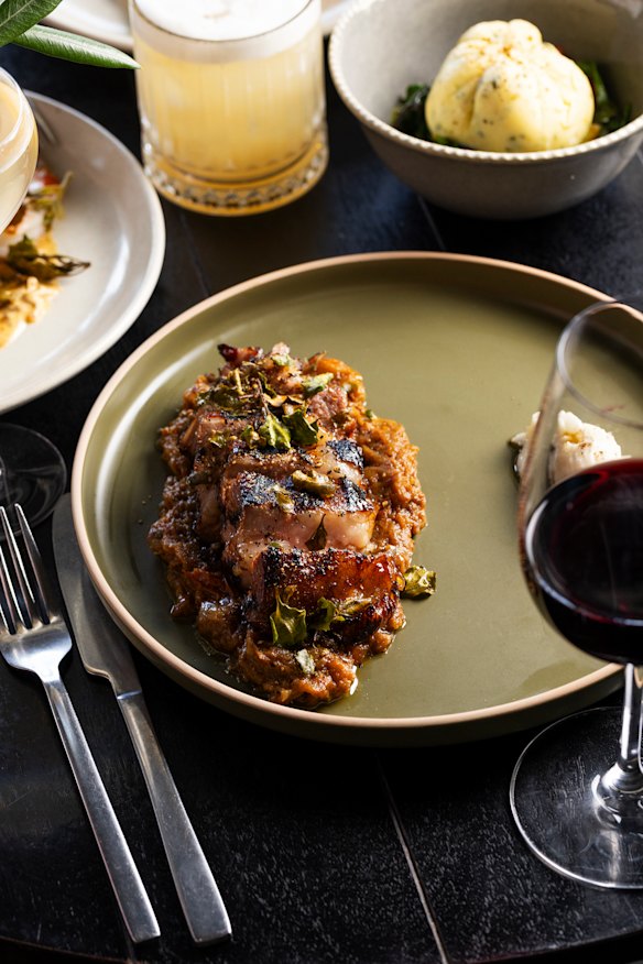 Grilled lamb neck with sweet and sour eggplant and toum.