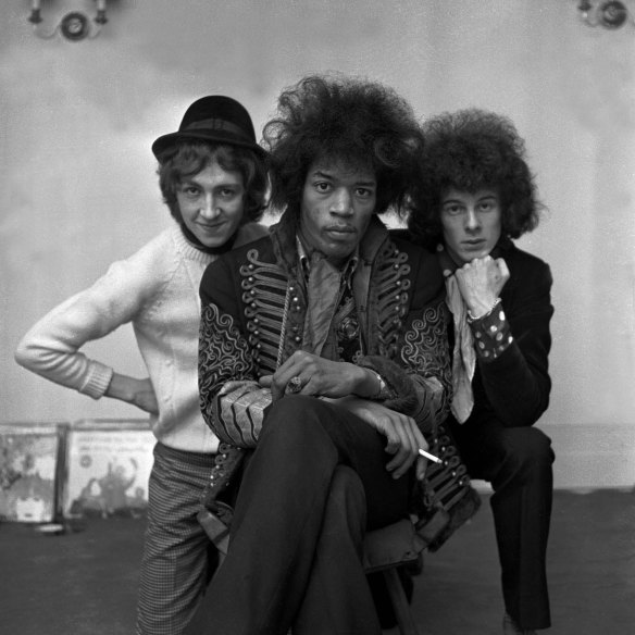 Jimi Hendrix in his iconic Hussar jacket with band members Mitch Mitchell and Noel Redding.