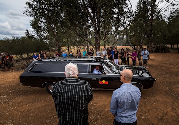 The hearse at the arrives at the ceremonial site in Wagga Wagga.