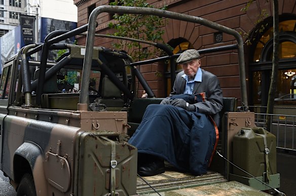World War Two veteran Stephen Walker 99yrs sits in a jeep as he waits to participate in the ANZAC Day March in Sydney.