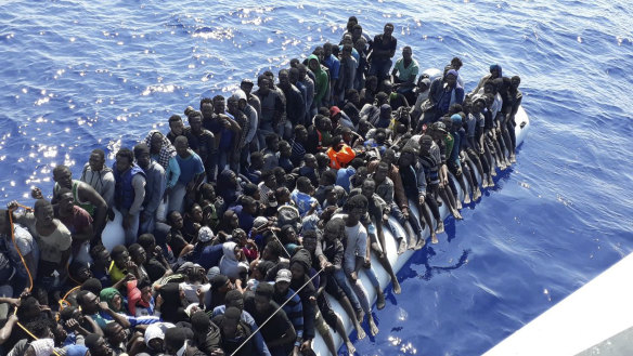 Migrants intercepted on a ship near Tripoli last week. 