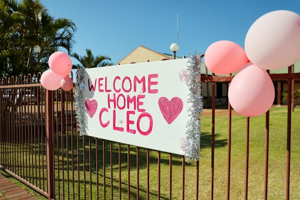 A sign is seen on a fence in celebration of the finding of Cleo Smith.