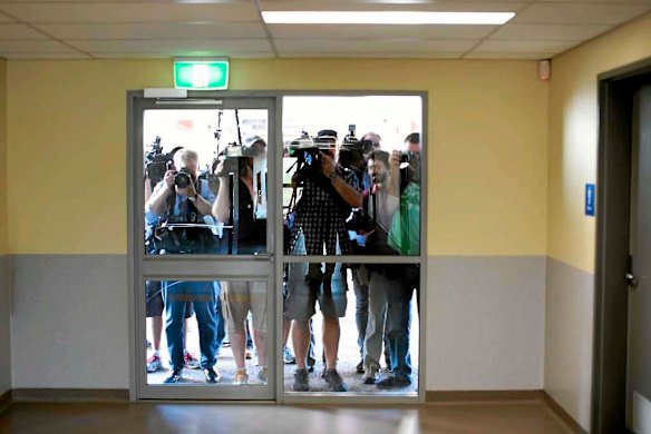 Prime Minister Kevin leaves the media behind while he visits GP Super Clinic in Palmerston, Darwin.