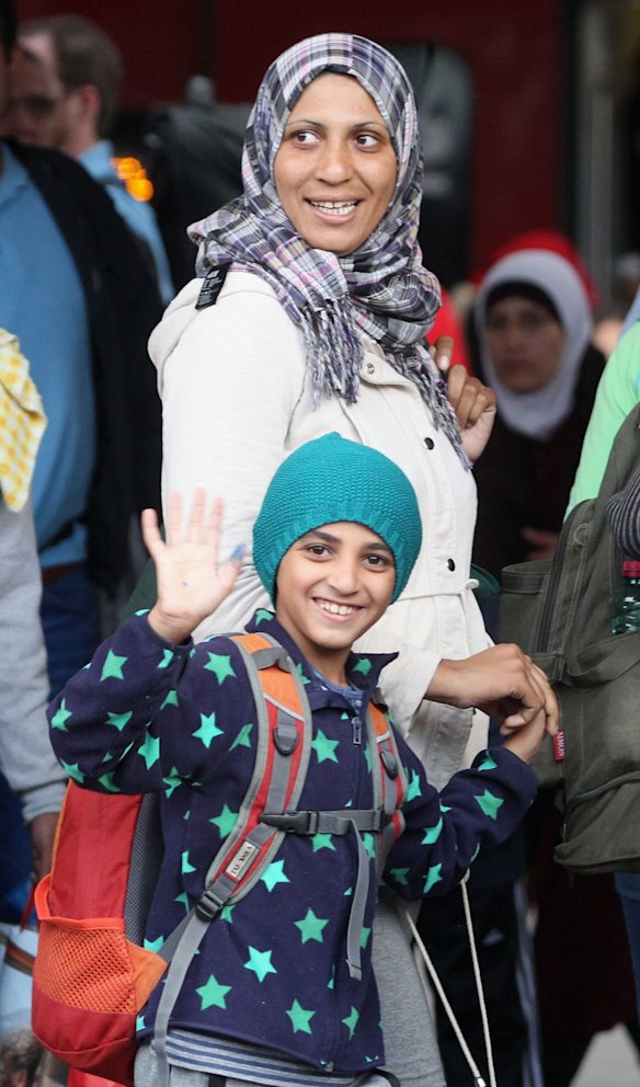 Migrants arrive from Austia at Munich Hauptbahnhof main railway station in Munich, Germany.