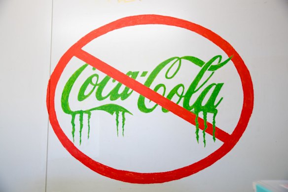 A hand painted sign on the wall of the dialysis unit in the remote aboriginal community of Yuendumu, which the Purple House has set up to treat renal failure patients so they don't have to leave their home to travel to Alice Springs for treatment.