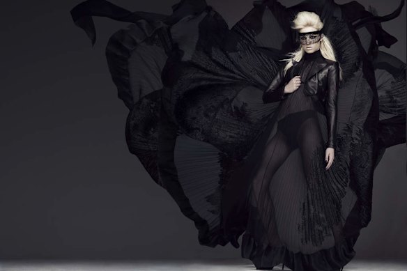 Andreja Peji? in The Boy Can?t Help It, Confessions Of A Child Of The Century collection, haute couture autumn?winter 2012-2013. Black leather mini tailcoat, black tattoo d?vor? pleated velvet jacquard dress.