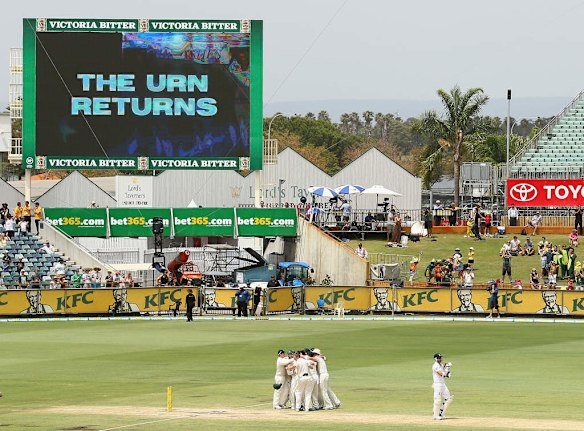 Australian players celebrate after they defeat England.