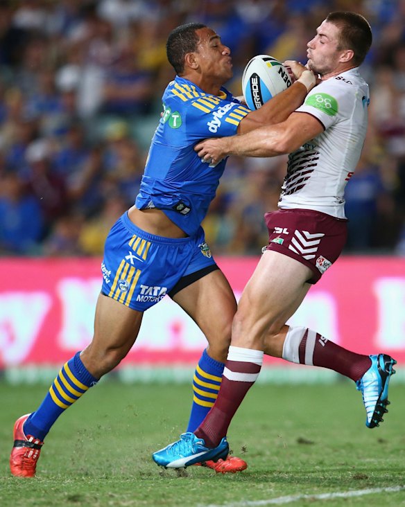 Will Hopoate charges into Kieran Foran.