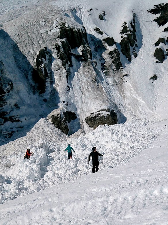 Rescue crews work work at the site of an avalanche site in the ski resort of Crans-Montana, Switzerland in 2019.