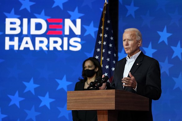 Democratic presidential candidate and former Vice President Joe Biden speaks Thursday, Nov. 5, 2020, in Wilmington, Del. Democratic vice presidential candidate Sen. Kamala Harris, D-Calif., stands at left.