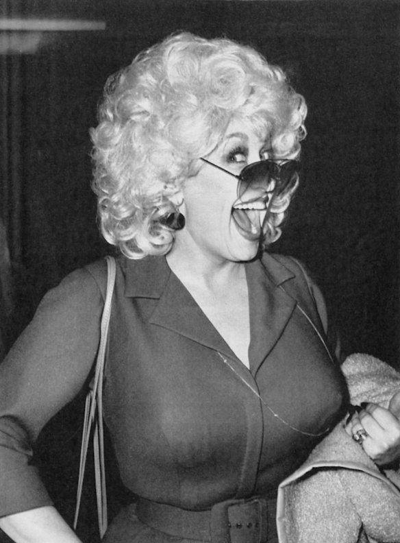 Singer-actress Dolly Parton arriving late for one of her three concerts at the Dominion Theatre. 1983