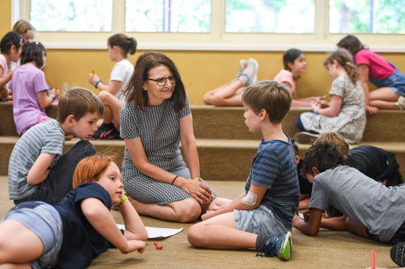 Princes Hill Primary School teacher Sia Vadiakis with students.  