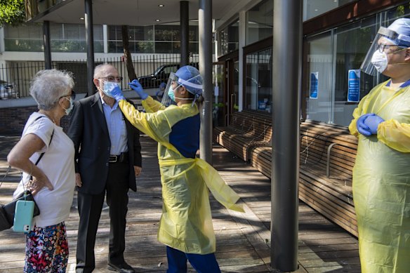 Ruby Princess Cruise Ship passengers Rona and her husband Michael arrive to have their second Covid-19 test.