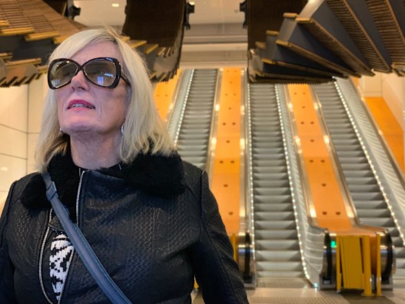 Photo of a commuter at Wynyard station, Sydney.  
