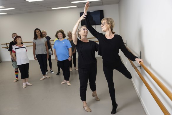 Silver Swans ballet teacher Rosemary Beagley teaching Kay Murphy at Theatre De La Danse in Brighton. 