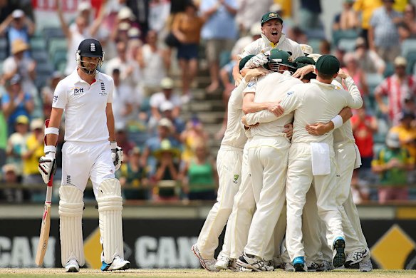 Australian players celebrate dismissing James Anderson of England