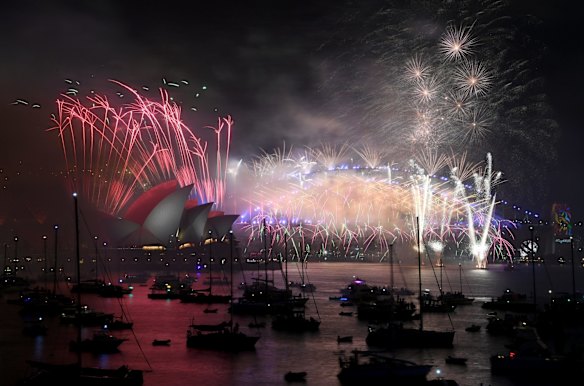 Sydney Harbour is lit up with fireworks on New Year's Eve.