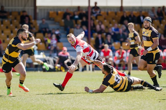 Canberra Vikings v Perth Spirit in National Rugby Championship rugby union. Canberra Vikings right flanker Tom Cusack, and Perth Spirits scrum half Michael Ruru, and tight head prop Tetra Faulkner.