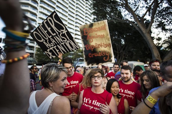 Tanya Plibersek is approached by protesters against mandatory detention. 
