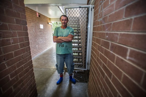 Tenders for the demolition of the Red Hill flats have been called for. Current resident Troy Osborn. 