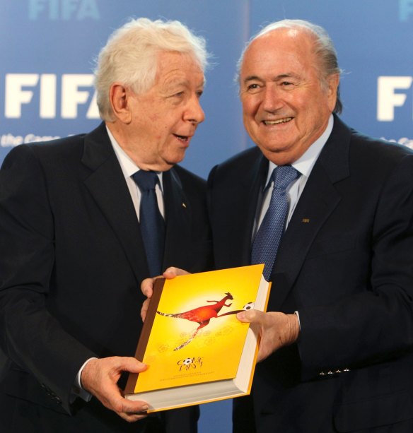 Optimist: Frank Lowy with FIFA boss Sepp Blatter. 