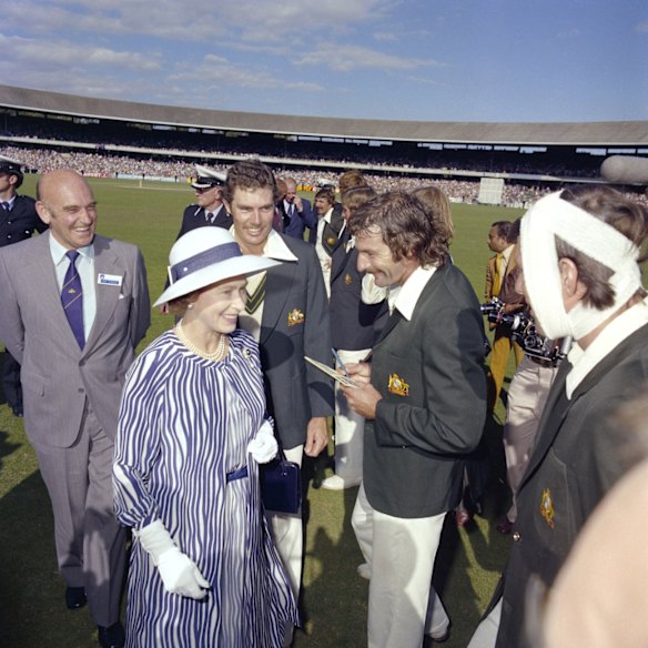 On 17 March 1977, the Queen visited the Melbourne Cricket Ground and met with the players during the tea break on the final day of the Centenary Test, which Australia won by 45 runs. Fast bowler Dennis Lillee asks the Queen for her autograph. The Queen declined but later sent Lillee a signed copy of this photograph. Australian captain Greg Chappell, batsman Rick McCosker, with bandaged head, and Ray Steele, Chairman, Co-ordinating Committee for Centenary Test Celebrations, look on.