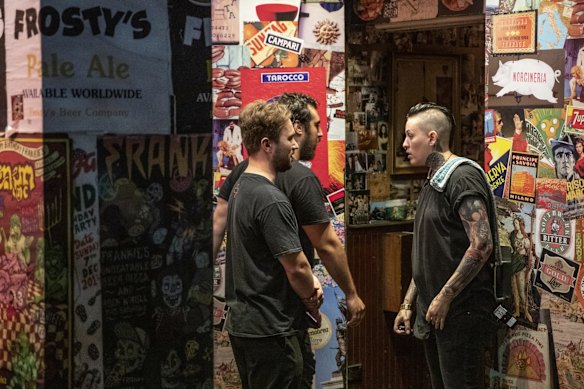 Staff screen patrons before entry at Frankie's.