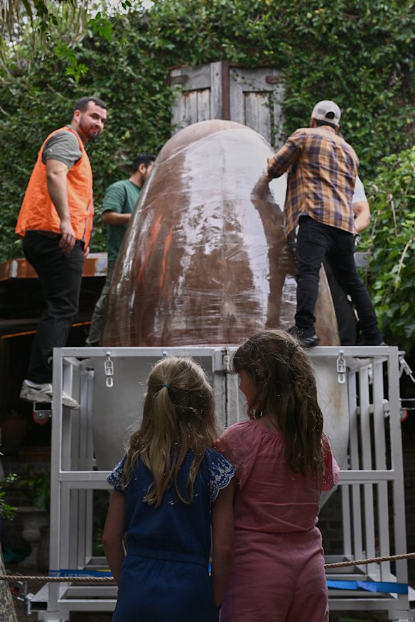 Visitors and staff prepare for The Grounds’ “Easter Egg Cracking Eggs-travaganza” in Alexandria.