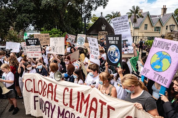 Young people gathered in front of the Prime Minister's Kirribilli residence for the School Strike 4 Climate protest.
