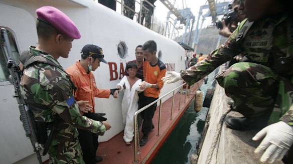 Immigrant survivor at Merak port.