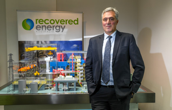 Recovered Energy Australia director Ian Guss with a model of the proposed waste to energy plant in Laverton North.