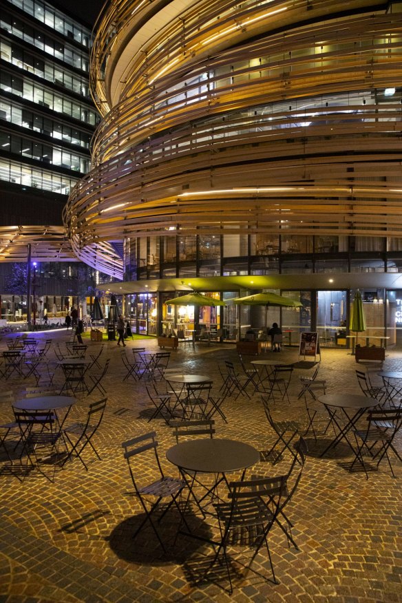 An empty outdoor eating space totally deserted.