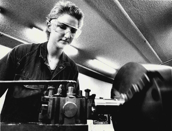 Anne Flanagan a fitter and Machinist at the School of Electrical Engineering at N.S.W. University works on the lathe. June 1, 1988