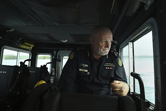 Australian Border Force (ABF) regional commander of Northern command Colin Drysdale on a fast response boat patrolling off Thursday Island. Torres Strait Treaty normally allows people to travel freely back and forth between the Torres Strait and PNG Treaty villages but this has been suspended due to the COVID-19 threat and both countries closing their borders. 